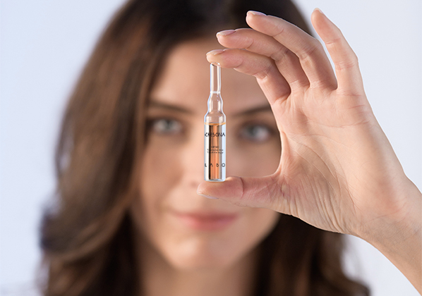 Crescina woman with vial Ksa